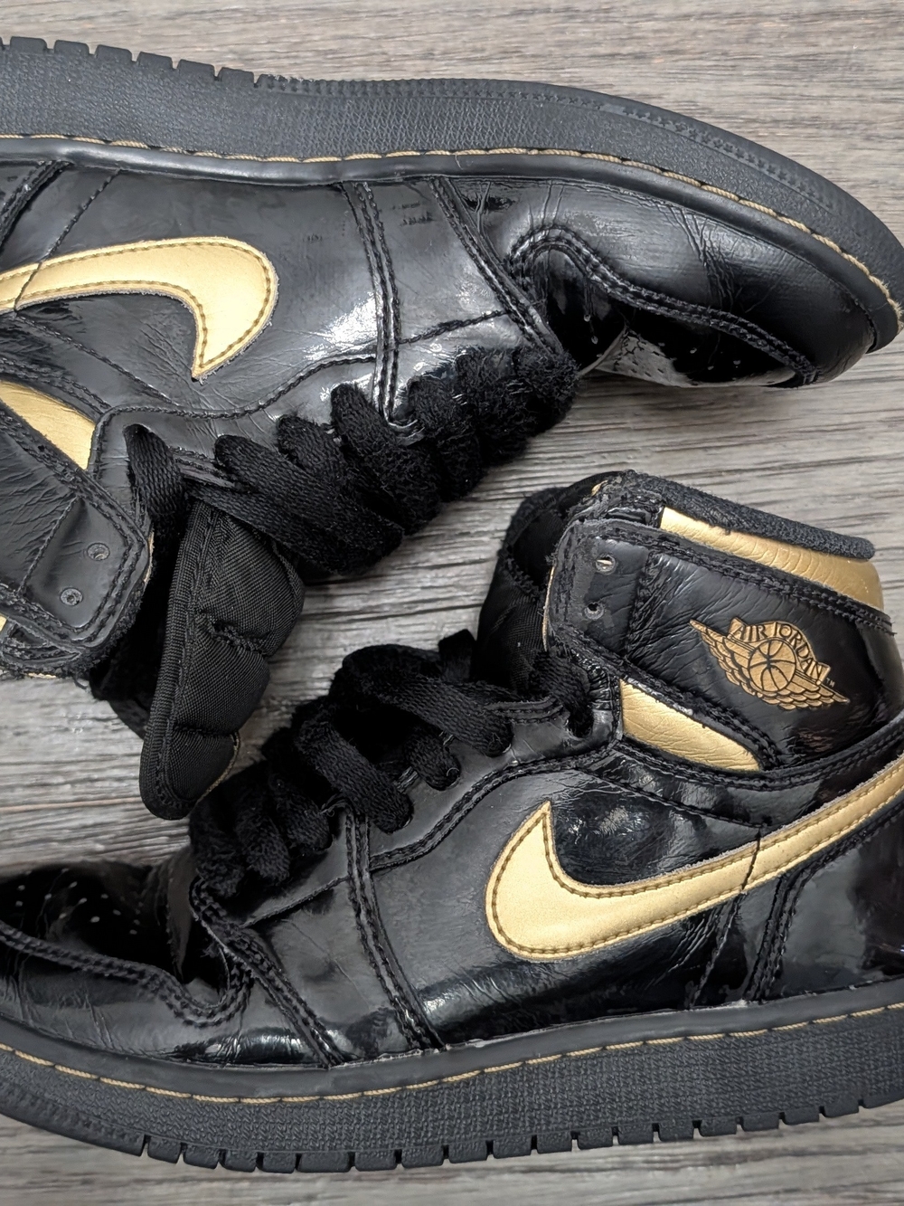 Jordan Kids Black and Gold High-Top Sneakers